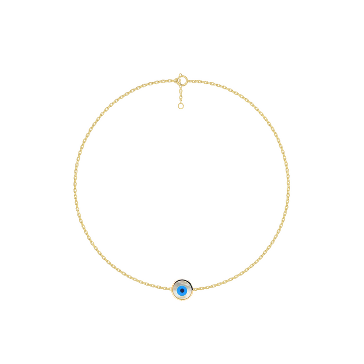 Gold necklace with a blue eye pendant on a white background