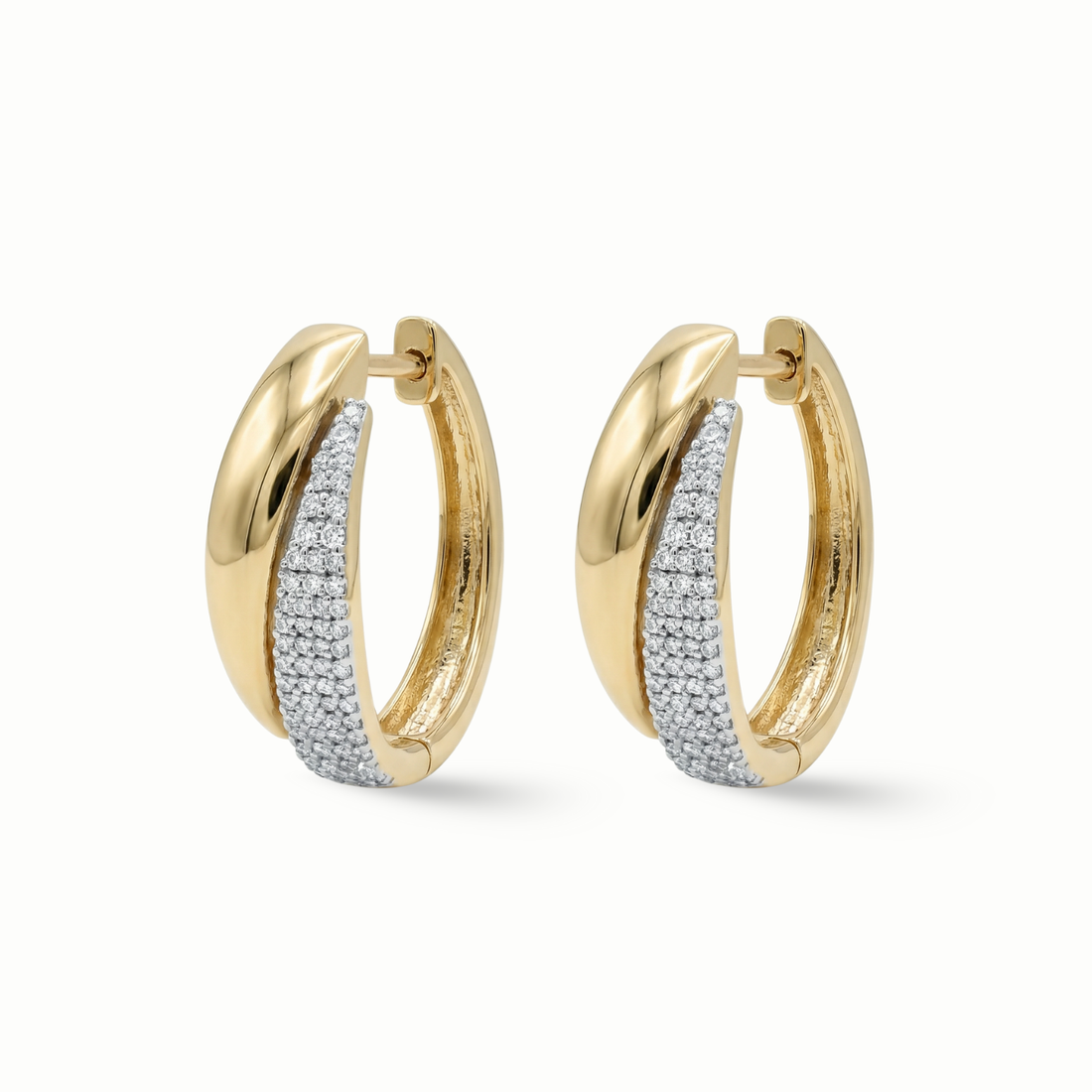 Pavé diamond huggie earrings 18K gold women Dubai UAE
