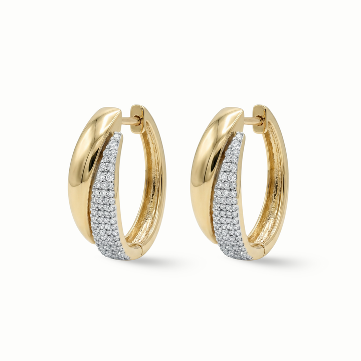 Pavé diamond huggie earrings 18K gold women Dubai UAE
